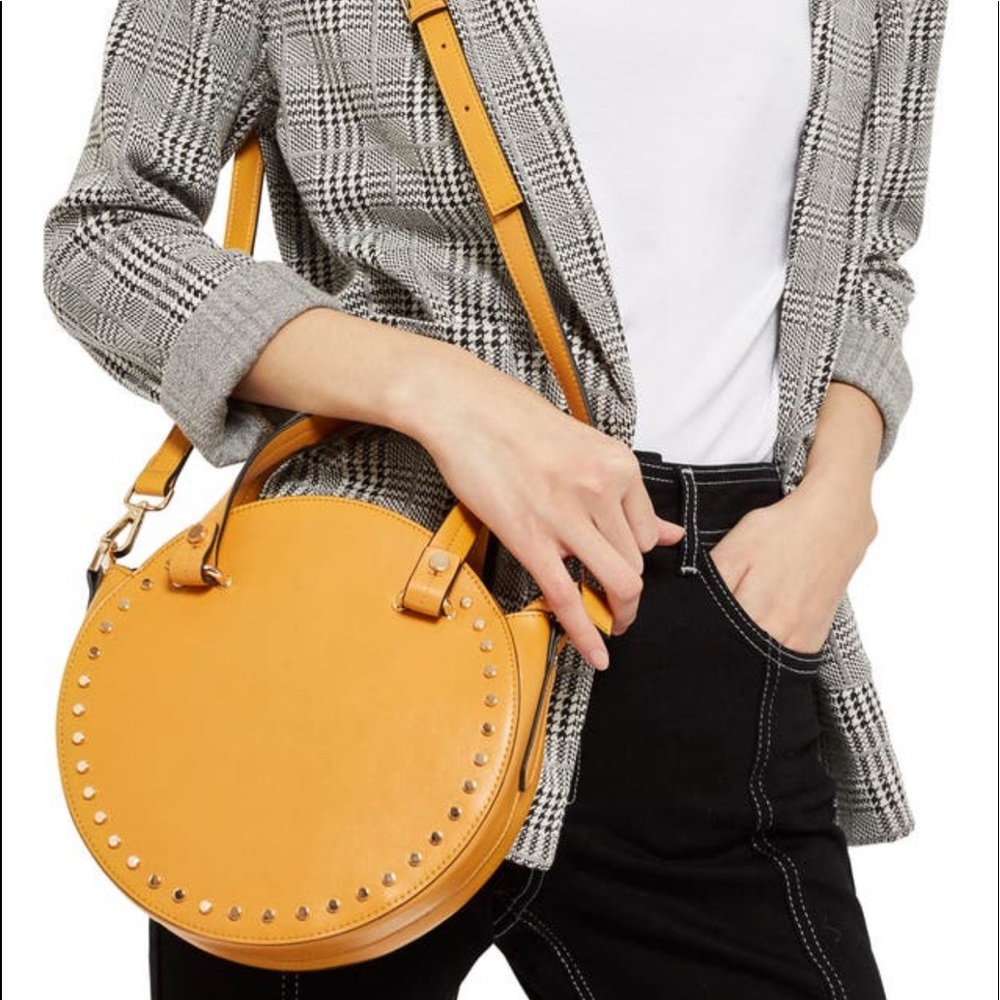 Top shop yellow circle crossbody purse